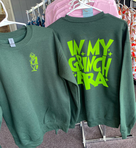 In my Grinch Era sweatshirt